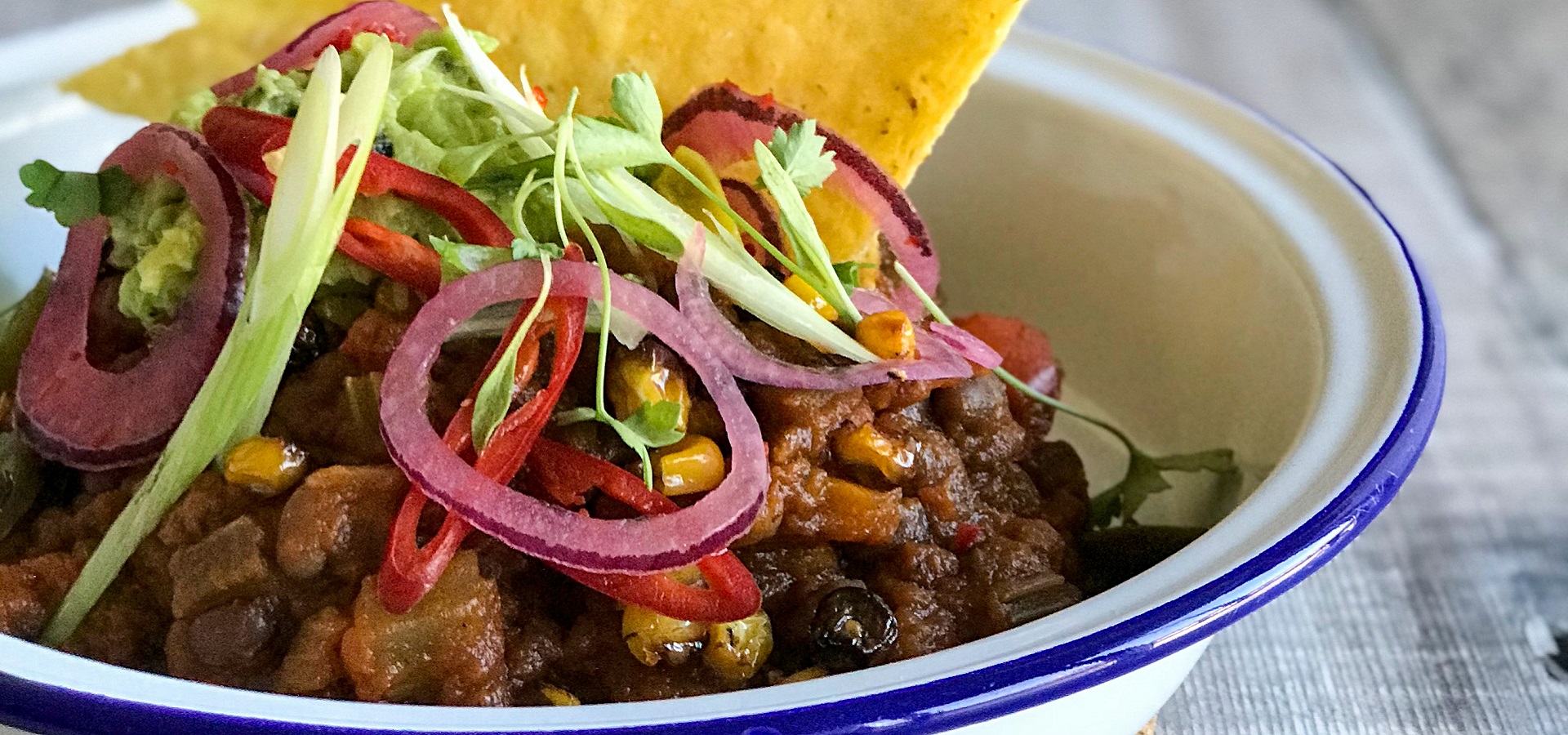 Squash Chilli with Avo & Crispy Tacos